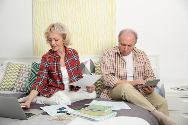A split image showing on one side a contented retiree enjoying their hobbies, and on the other side, an anxious retiree struggling with bills.