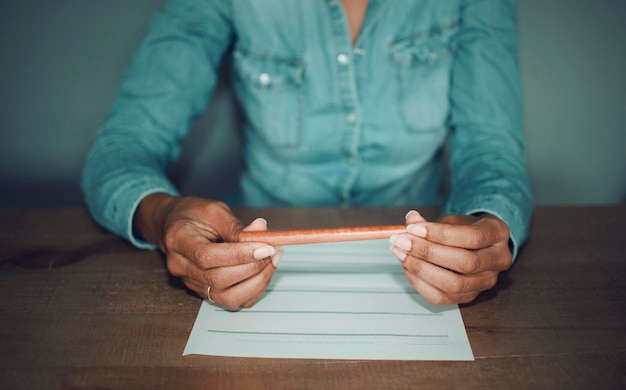 A close-up of a government document related to student loan forgiveness, highlighting complex terms and conditions, with a hand pointing at a specific clause.