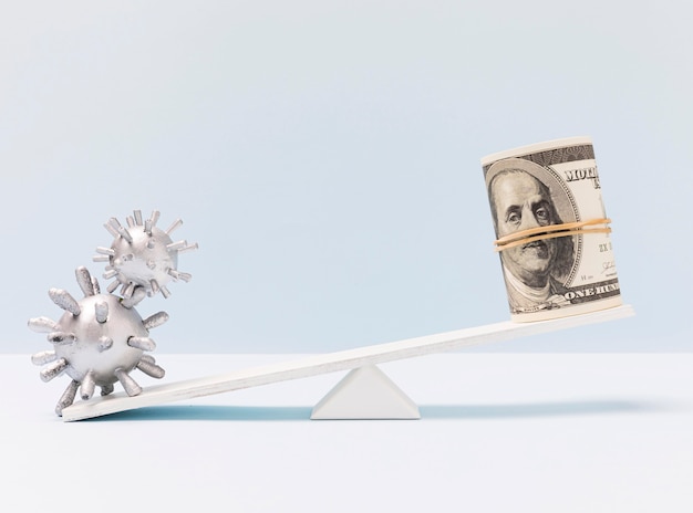 A seesaw representing the balance between government spending and revenue, with the national debt looming in the background, illustrating the potential instability caused by an imbalance.