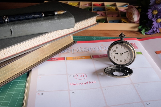 A calendar marked with specific study times, alongside a list of daily tasks leading to skill mastery. The scene emphasizes planning and discipline.